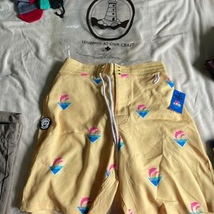 SOLD Pink dolphin swim short trunks size 30 yellow
